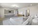 Bright main bedroom featuring neutral colors, carpeted floor and bathroom access at 13242 Orange Isle Dr, Windermere, FL 34786