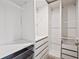 White walk-in closet featuring shelving and drawers at 13242 Orange Isle Dr, Windermere, FL 34786