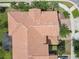 An overhead image reveals the meticulously maintained landscape and roof of the property, providing a bird's-eye perspective at 14014 Millington St, Orlando, FL 32832