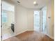 Hallway leading to bathroom and bedroom, with neutral walls and carpeted flooring at 14014 Millington St, Orlando, FL 32832
