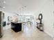 Open-concept living space seamlessly integrates kitchen, dining, and living areas for modern living at 14014 Millington St, Orlando, FL 32832