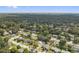 Drone view of the community featuring lush green trees at 145 Burns Ave, Longwood, FL 32750