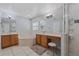 The bathroom has tiled floors, and sinks, vanity, and a jacuzzi soaking tub at 145 Burns Ave, Longwood, FL 32750