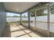 Enclosed patio with neutral walls and a view of the fenced-in backyard at 145 Burns Ave, Longwood, FL 32750