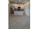 Open-concept kitchen with stainless steel appliances and ample space for dining at 14867 Driftwater Dr, Winter Garden, FL 34787