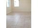 Spacious living room with tile flooring and natural light perfect for comfortable living at 14867 Driftwater Dr, Winter Garden, FL 34787