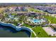 Resort-style community featuring multiple pools, clubhouse, and Gathering-friendly amenities with lush tropical landscaping at 1569 Carey Palm Cir, Kissimmee, FL 34747