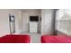 The bedroom has two twin beds with modern decor, offering a comfortable and stylish retreat at 1569 Carey Palm Cir, Kissimmee, FL 34747