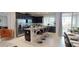 Modern kitchen with stainless steel appliances, granite countertops, and a breakfast bar for casual dining at 1569 Carey Palm Cir, Kissimmee, FL 34747