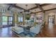 Bright living room with comfortable seating, stylish decor, and views of the community at 1569 Carey Palm Cir, Kissimmee, FL 34747