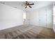 Empty room with neutral carpet and a ceiling fan at 15727 Vetta Dr, Montverde, FL 34756