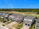Beautiful two-story homes feature brick driveways and attached garages at 15727 Vetta Dr, Montverde, FL 34756
