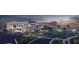 Modern hospital building with lush landscaping at dusk at 2075 Huntsman Ridge Rd, Clermont, FL 34715