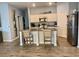 Bright kitchen featuring granite countertops, stainless steel appliances, and a center island at 2075 Huntsman Ridge Rd, Clermont, FL 34715