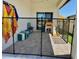 Fenced patio area perfect for play, along with an area for pool towels and seating at 2075 Huntsman Ridge Rd, Clermont, FL 34715