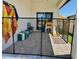 Enclosed patio with outdoor toys and pool towel rack at 2075 Huntsman Ridge Rd, Clermont, FL 34715