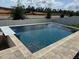 Backyard pool with a tanning ledge at 2075 Huntsman Ridge Rd, Clermont, FL 34715