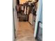 Spacious walk-in closet with ample shelving, storage, and wood-look tile floors at 2075 Huntsman Ridge Rd, Clermont, FL 34715