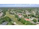 Beautiful aerial view of the property showcasing its location on the golf course and lush surroundings at 216 Hammock Oak Cir, Debary, FL 32713