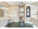 Spacious bathroom featuring a vanity area and a view into the bedroom at 216 Hammock Oak Cir, Debary, FL 32713