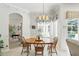 Charming breakfast nook offers views of the backyard pool and comfortable seating at 216 Hammock Oak Cir, Debary, FL 32713