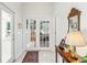 Welcoming entryway with tile flooring and a view through glass doors to an inviting living area at 216 Hammock Oak Cir, Debary, FL 32713