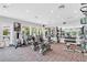 Fitness center equipped with modern exercise machines, weights, and mirrored wall at 216 Hammock Oak Cir, Debary, FL 32713