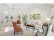 Bright living room featuring neutral colors, tile floors, and elegant furnishings near the entry at 216 Hammock Oak Cir, Debary, FL 32713