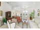 Elegant living room boasts a welcoming entrance, white pillars, and a combination of modern and classic furniture at 216 Hammock Oak Cir, Debary, FL 32713