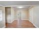 Bright bedroom featuring hardwood floors, neutral paint, recessed lighting and natural light from the window at 246 N Oak Ave, Orange City, FL 32763