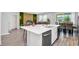 Kitchen with stainless steel appliances, a large island and ample storage space at 2616 Calistoga Ave, Kissimmee, FL 34741