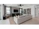 Bright living room with neutral colors, contemporary furniture, and stylish decor at 2741 Serenity Meadow Dr, Kissimmee, FL 34744