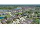 Picturesque aerial shot of a well-planned community with houses, lakes, and lush landscaping at 2827 Moonstone Bnd, Kissimmee, FL 34758