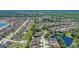 Sprawling residential community featuring homes nestled amidst lush greenery and scenic lakes at 2827 Moonstone Bnd, Kissimmee, FL 34758