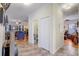 Hallway with tile flooring, leading to the living room at 2827 Moonstone Bnd, Kissimmee, FL 34758