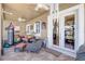 Outdoor patio featuring wicker furniture, a ceiling fan, and a punching bag at 2827 Moonstone Bnd, Kissimmee, FL 34758