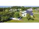 A well maintained and landscaped home with mature trees and white picket fence at 2984 Monica Ter, Kissimmee, FL 34744