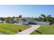 Beautiful one story home with a well manicured lawn, mature landscaping, and a long driveway at 2984 Monica Ter, Kissimmee, FL 34744