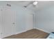 Bright bedroom with hardwood floors, two closets, and neutral paint at 314 E Bonnie Trl, Longwood, FL 32750