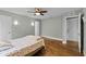 Bedroom featuring hardwood floors, neutral walls, and ample closet space at 314 E Bonnie Trl, Longwood, FL 32750