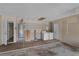 A spacious garage featuring a laundry area, water heater, and access door at 314 E Bonnie Trl, Longwood, FL 32750