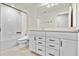 Bathroom featuring modern vanity, quartz countertop, and a combined shower and tub at 327 Island Sound Ct, Longwood, FL 32779
