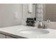 Close-up of bathroom features a white vessel sink and countertop at 327 Island Sound Ct, Longwood, FL 32779