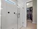 Shower with glass enclosure and white subway tile in this bathroom with walk-in closet at 327 Island Sound Ct, Longwood, FL 32779