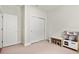 Bright bedroom featuring neutral carpet, a closet, and a miniature play kitchen at 327 Island Sound Ct, Longwood, FL 32779