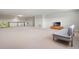 Spacious bonus room with plush carpet, ideal for creating a custom entertainment or recreation area at 327 Island Sound Ct, Longwood, FL 32779