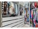 Spacious walk-in closet with ample storage space, multiple shelves, drawers, and hanging rods at 327 Island Sound Ct, Longwood, FL 32779