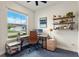 Functional home office with a large window and modern decor at 327 Island Sound Ct, Longwood, FL 32779