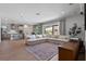 Open-concept living room with expansive outdoor views and casual dining at 327 Island Sound Ct, Longwood, FL 32779