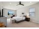Spacious main bedroom with ample natural light, recessed lighting, and neutral carpet at 327 Island Sound Ct, Longwood, FL 32779